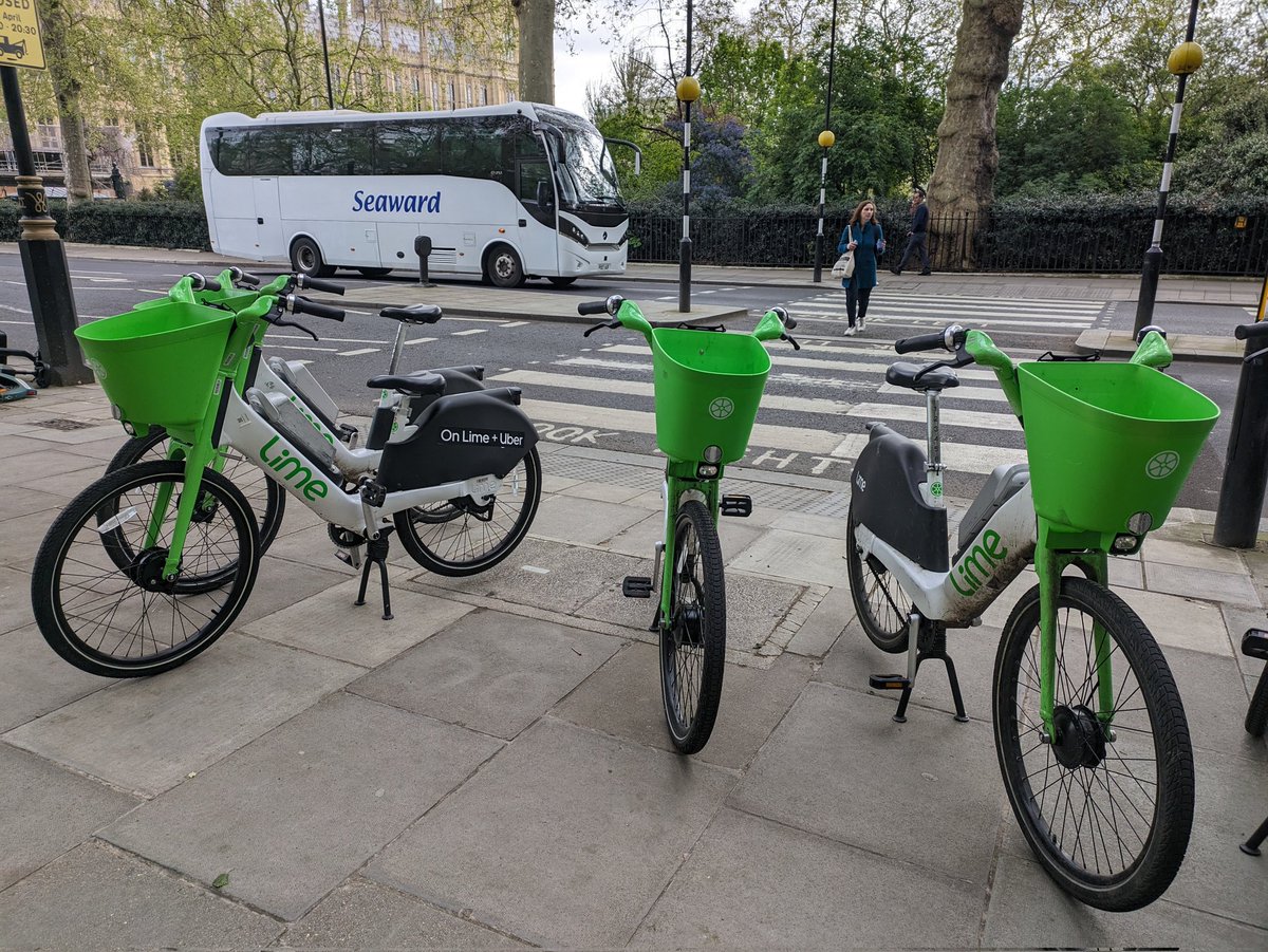 KateWallis's tweet photo. @limebike can you send someone to deal with the proliferation of bikes on Millbank which have nearly blocked the footpath and have blocked access to the bike racks and zebra crossing? https://t.co/ktHtItCFG3