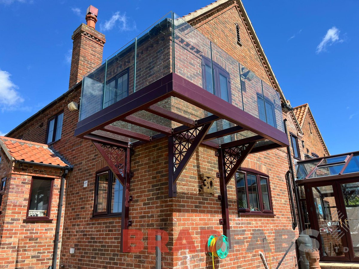 3.8m x 3.4m bespoke L shaped, wrap around balcony with triple laminated glass floor. Free quotes available - sales@bradfabs.co.uk or bradfabs.co.uk