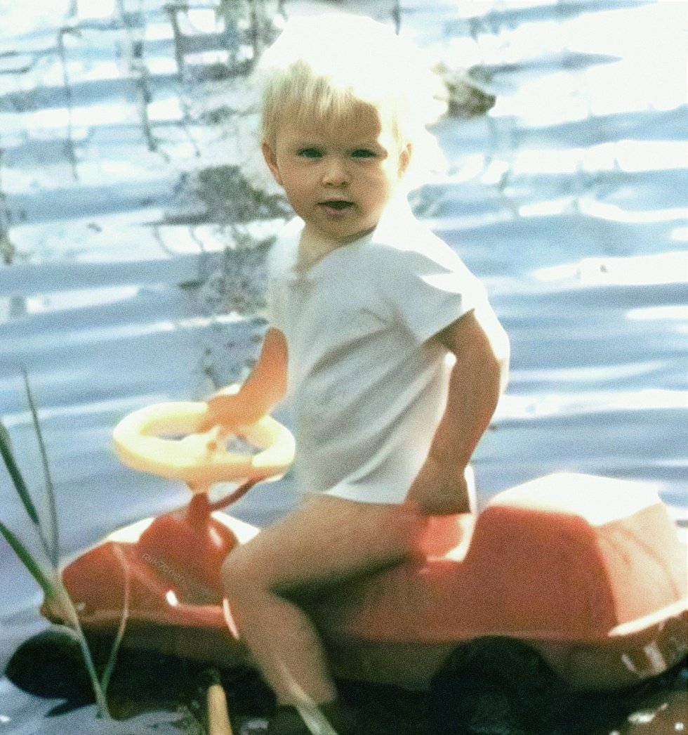 baby kimi raikkonen with his little red toy car in 1981