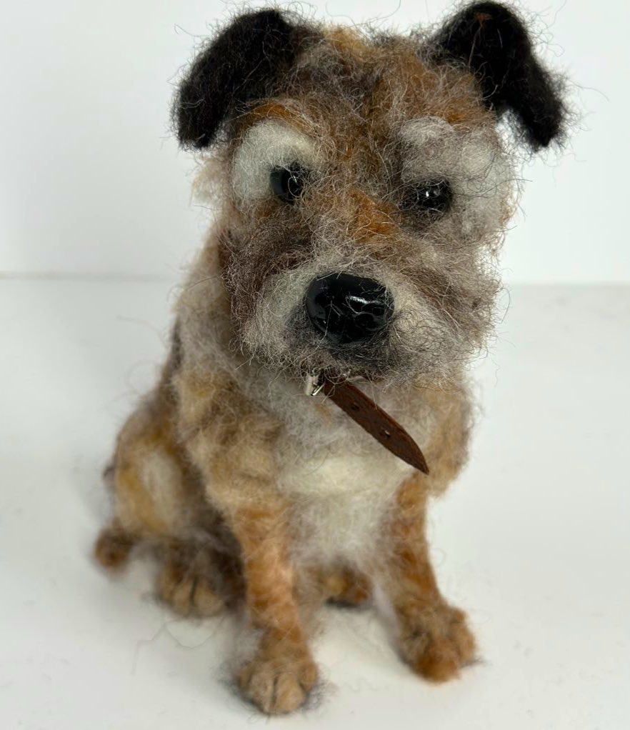 A needle felted Border Terrier