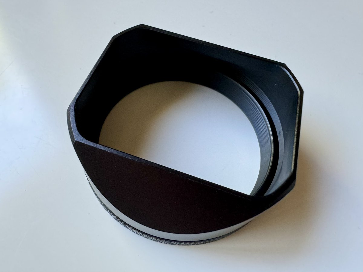 A_Higgins's tweet photo. Lens hood has arrived for my #X100VI (very nicely made, by the way). Only another six months or so on the waitlist until the camera might arrive too 😕 https://t.co/izbVrWwNO9