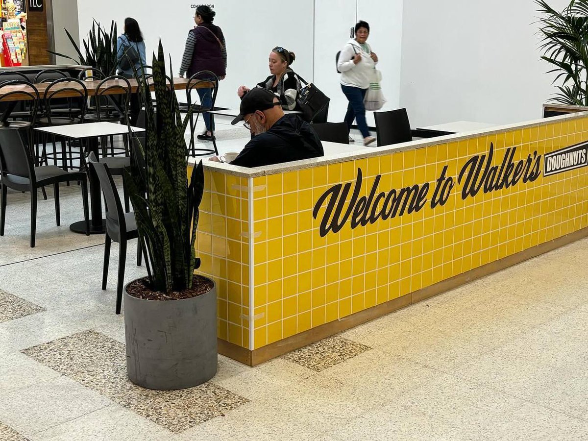 WalkersDougnuts's tweet photo. Airport West FAM, did you miss us?! 💛 
We are back, we’ve had a makeover and look AMAZING! Pop in and see Joe &amp; the gang for your choice of 40 delicious doughnut 🍩 flavours (and he makes a GREAT coffee ☕️ as well 😜)
#Walkersdoughnuts https://t.co/JYAy6A9uEI