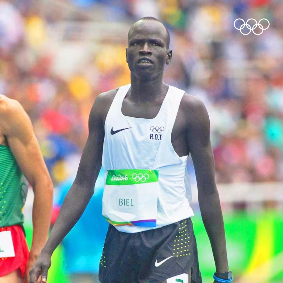 2005: Yiech Pur Biel flees war-torn South Sudan to settle in the Kakuma Refugee Camp in Kenya. 2015: Is selected to join the Tegla Loroupe Foundation and starts running professionally. 2016: Makes the IOC Refugee Olympic Team and competes at #Rio2016. 2020: Is selected to be a…