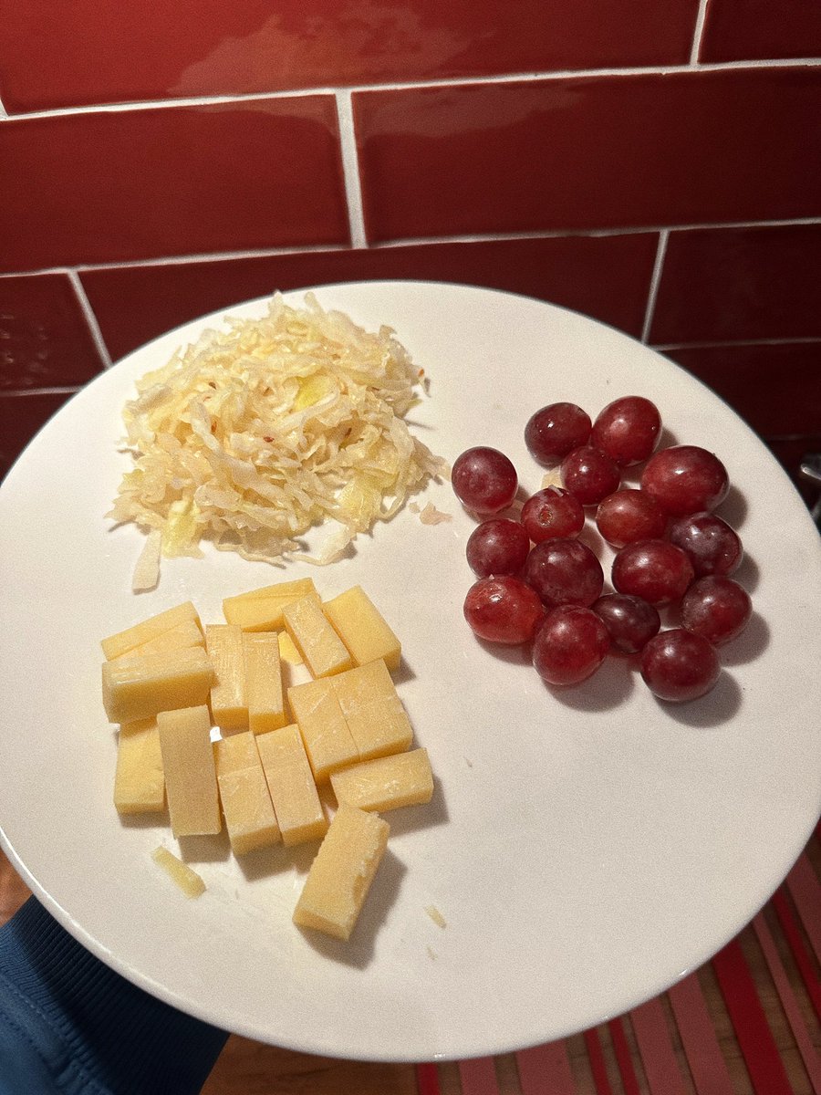 Just a humble food poaster grape, sauerkraut, raw gruyere cheese