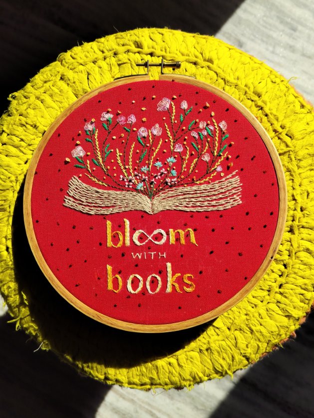 Fresh off my hoop

Bloom with Books. 

The basic design idea is borrowed from an illustration. I have given it own interpretation and quotation. 
I think it has come out bright, cheerful and meaningful too. 

#embroidery
#artforsale