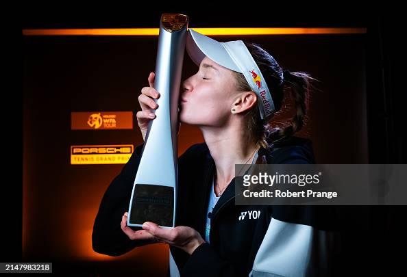 Elena Rybakina of Kazakhstan poses with the #champions trophy after defeating Marta Kostyuk of Ukraine in the singles final at #PorscheTennis Grand Prix #Stuttgart 2024 at Porsche Arena in Germany. 📸: Robert Prange