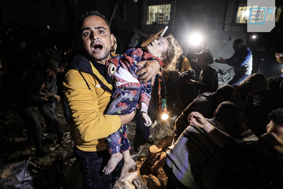 The series captures Israeli strikes for <a href="/AFPphoto/">AFP Photo</a> by photojournalist <a href="/MahmudHams/">Mahmud Hams</a> was awarded with the Story News 1st prize winner of 10th #İstanbulPhotoAwards .