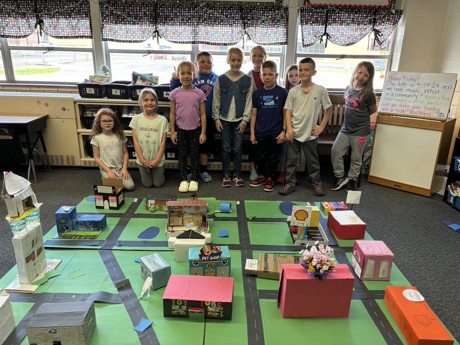 First graders show off their community.