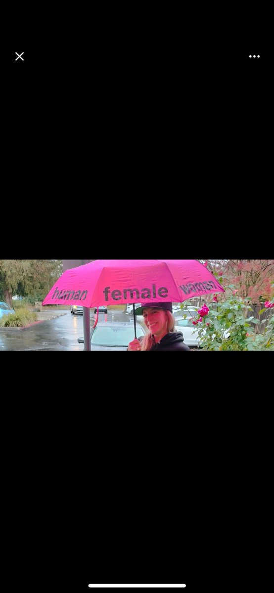 Do these disgusting people ever realize how stupid they look when they carry around a pink umbrella that says “human female woman” on it? Like what is this crap? #TransRightsAreHumanRights #TransRights
