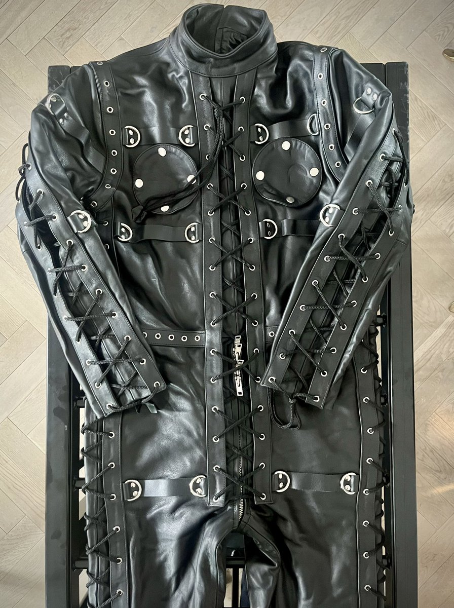 Just look at all that lacing, all those attachment points, all the easy access features and last but not least, this leather bondage suit is also leather lined. Thank you @LeatherPrison. Leather bondage dreams do come true.