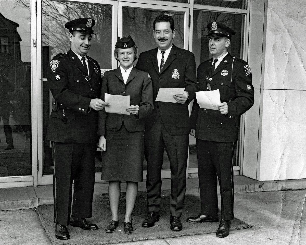 Art Faguy (also of @CFL fame), Esther Hunter (Red Cross), Fred Brewer and Bud Kennish with a presentation to the Canadian Red Cross #HPSArchives #PoliceHistory #HamOnt #HamOntHistory #HPSHistory #HPSMuseum