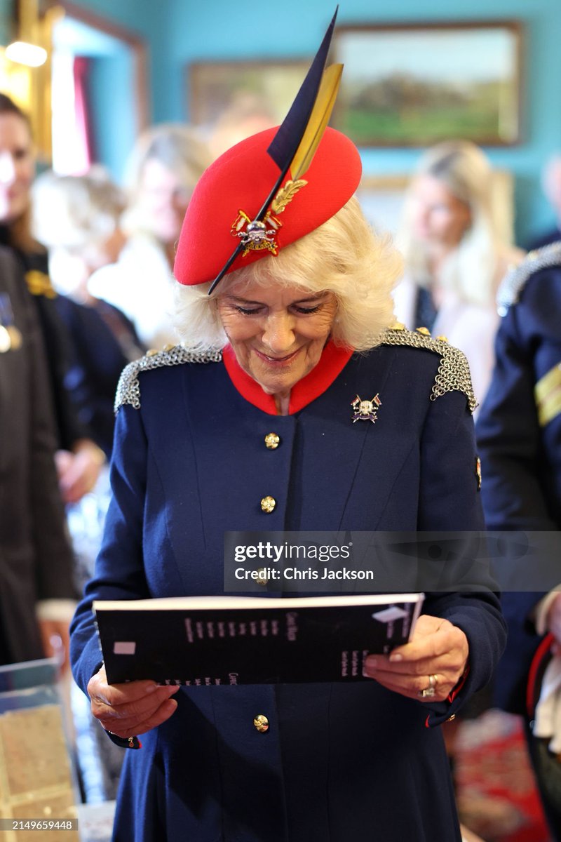 Queen Camilla with the photograph. 🥹❤️