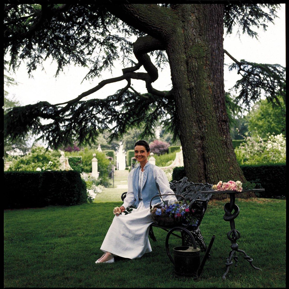 Happy #EarthDay! 🌍 Audrey Hepburn photographed filming Gardens of the World at the Hidcote Manor Gardens, England, 1990