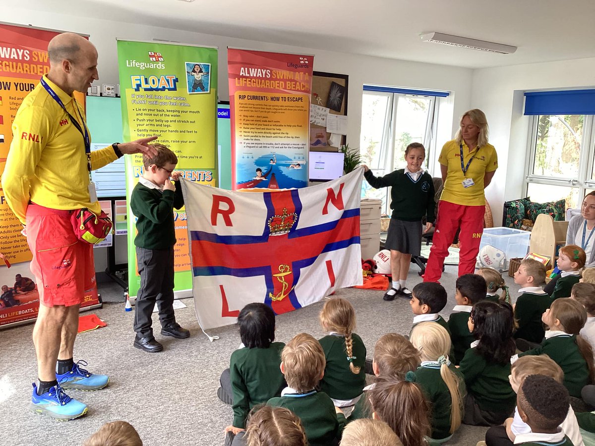 Launcestonprim_'s tweet photo. RNLI Beach Safety Assembly: We welcomed Amy and Glynn who taught the children about beach safety. They learnt about which flags to look for when on the beach, what to do if you get into a bit of trouble and what equipment lifeguards use to help keep everyone safe. H @RNLI  🌊⛱️ https://t.co/j4Q9IaV2S6