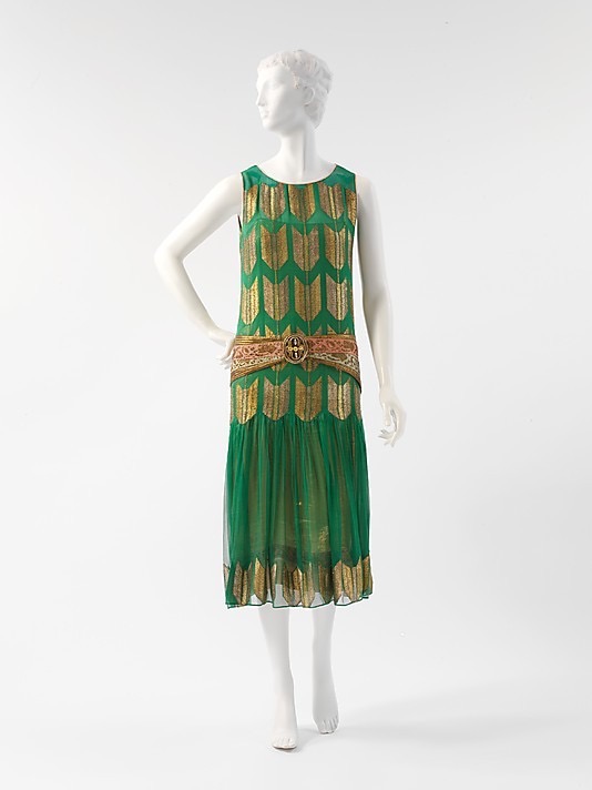 The #frockingfabulous “Flêche d’Or” by #PaulPoiret, showcases the Egyptian influence in 1924, right down to a scarab belt clasp. #Fashionhistory via the Met.