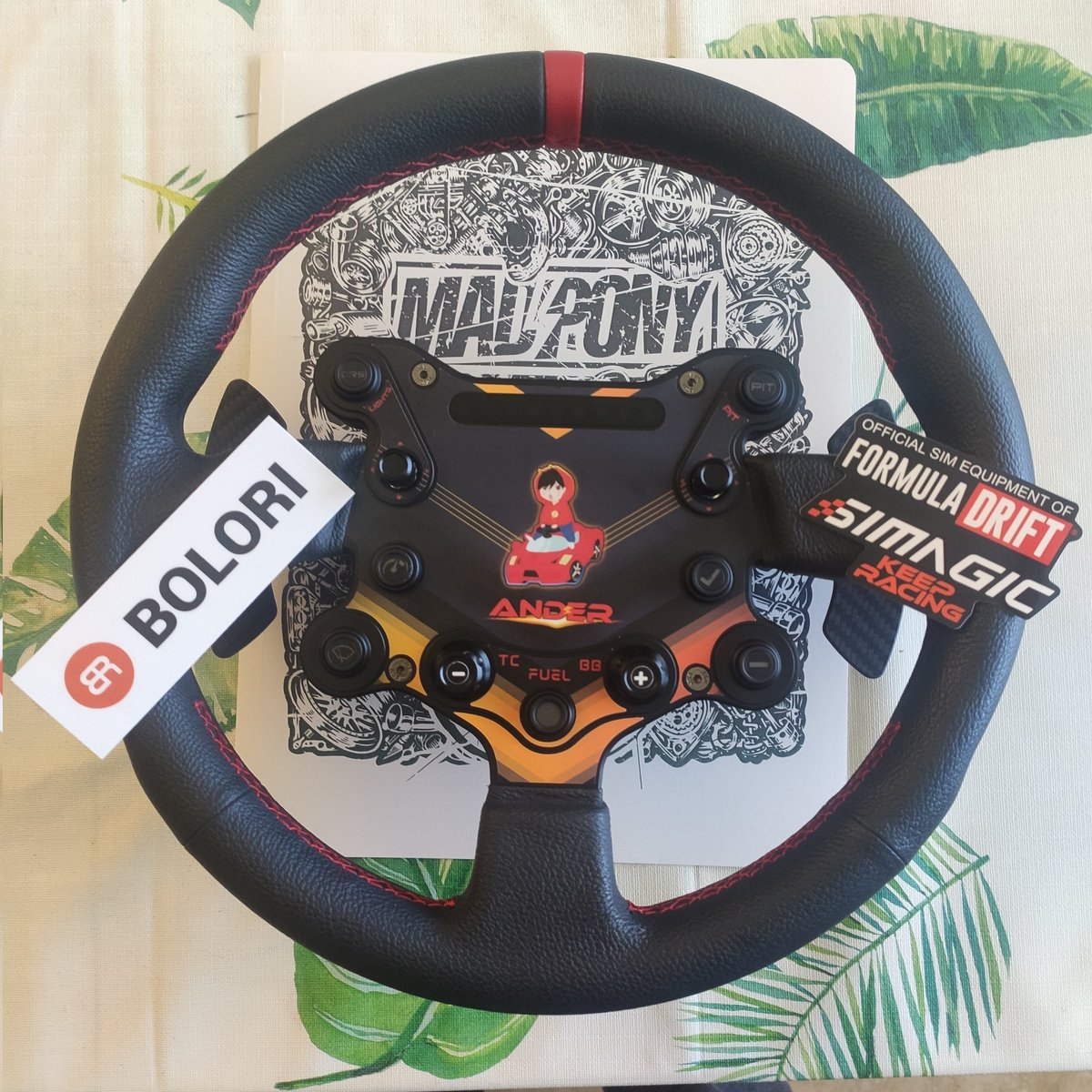 Ya tengo mi diseño personalizado de <a href="/MadponyStickers/">MADPONY</a> en mi <a href="/SimagicOfficial/">Simagic official</a> GTS, comprado en <a href="/bolori/">Bolori</a>!!!
Pd: Sere igual de malo conduciendo, pero ahora soy un malo pero con estilo 💪🏻😎