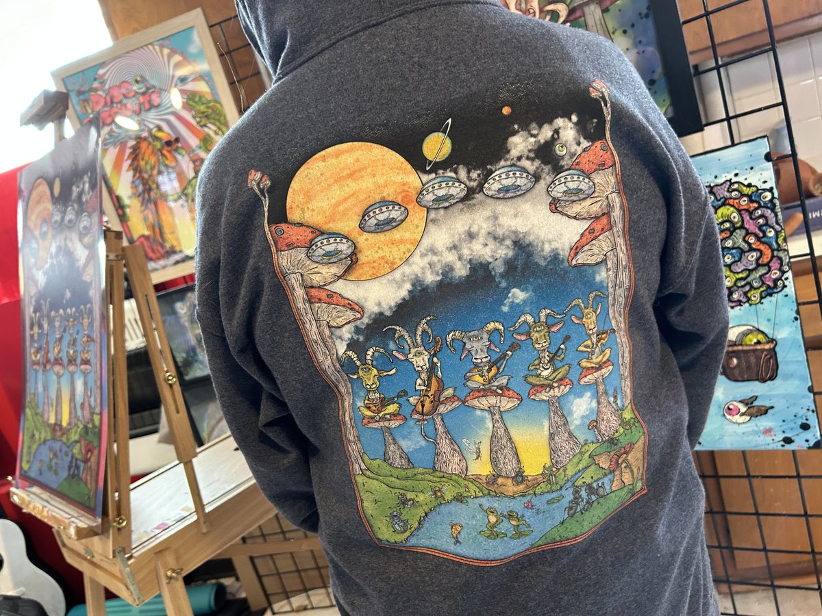 We canNOT stop selling this hoodie. I'm actually wearing it right now (that's me!) and it's so comfy (this is after a wash!) and the print that goes with it is almost sold out! #BMFS #billystrings #billygoats #goat #alien #jamband #PartyTime #mushroom #hoodie