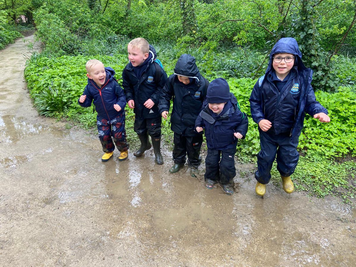 Reception are having great fun @BurnbyGardens, embracing the wet weather!