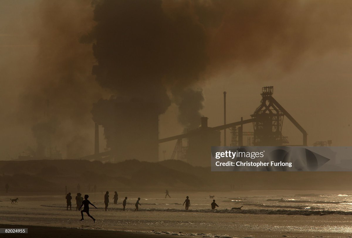 shitbritishpics's tweet photo. Locals and children play on the surf at high tide on Redcar beach in the shadow of the Corus Steelworks in Teesside, in Middlesbrough, England (2008) https://t.co/s0sJlim0Yo