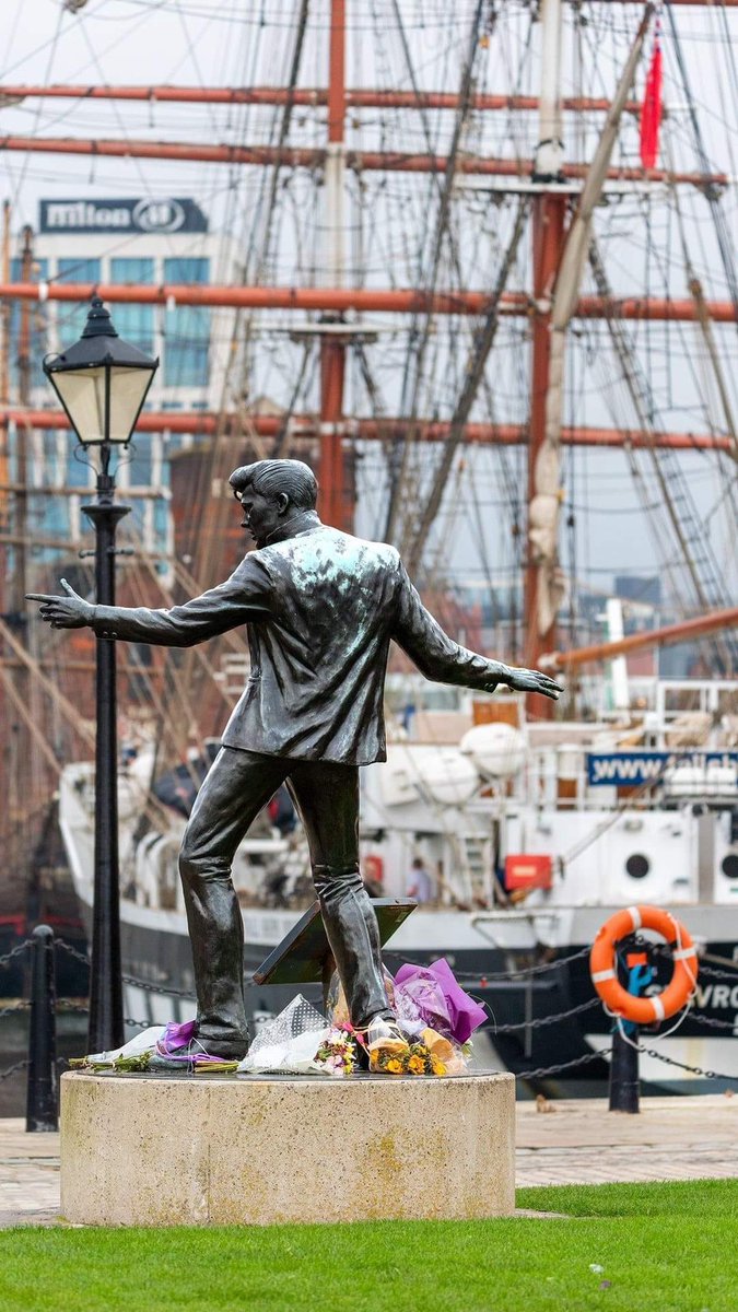 #Liverpool first rock star. Billy Fury statue, sculpted by Tom Murphy. Canning Half Tide Dock in the background.