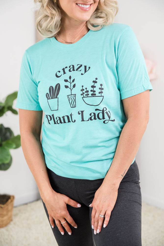Be the cutest crazy plant lady on the block in this seagreen heathered graphic tee. Pair it with flare leggings or Judy Blue jeans while you walk through the house watering each of them. 
#plant #plantlady #plantlife #blue #graphictee