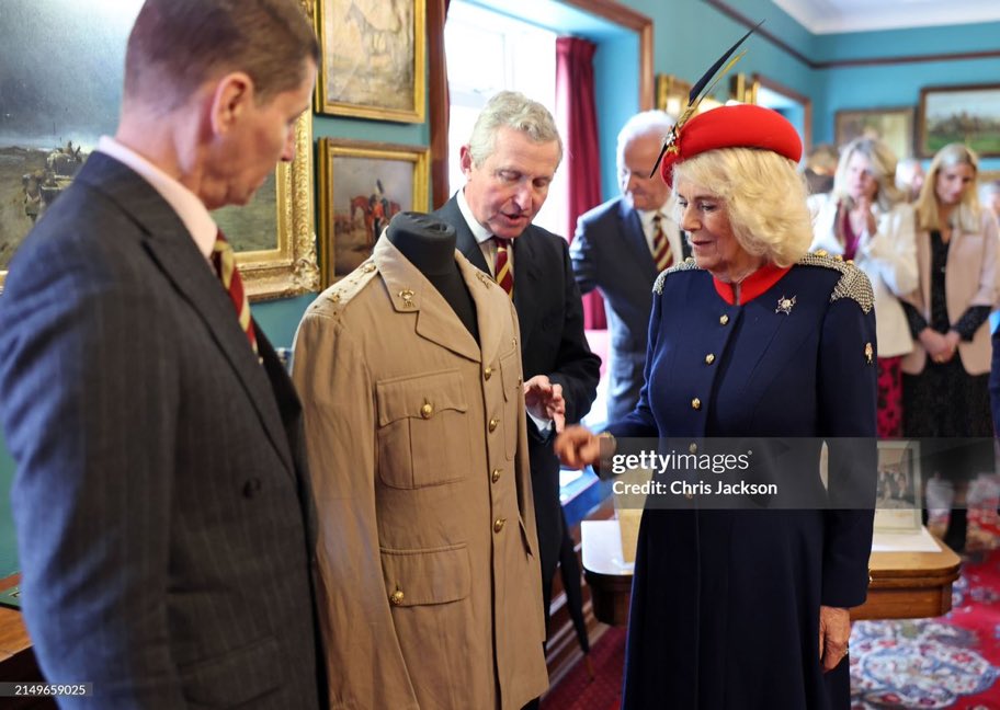 Queen Camilla with her father’s uniform, who served in WWII.  What a moment.