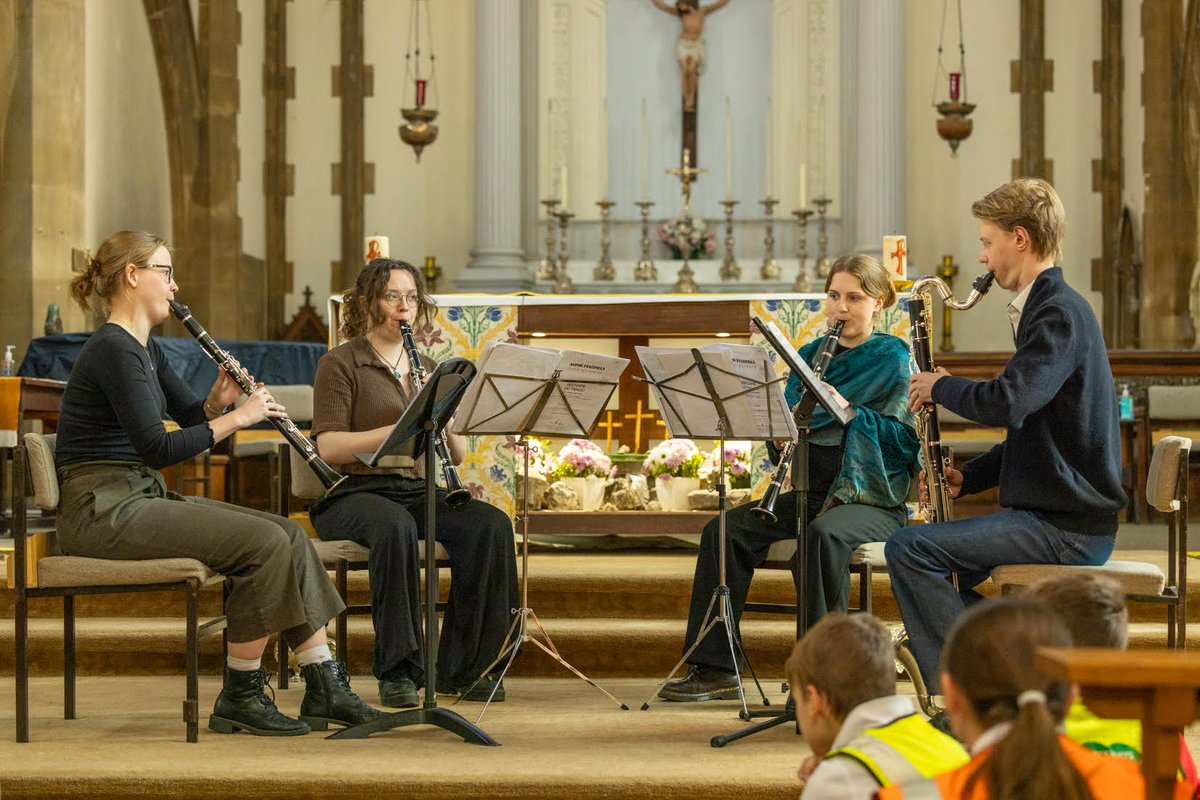 In the second of our lunchtime concerts for schools a quartet of talented young clarinettists from @RCMLondon performed for more than 200 children in Charlton Church #Dover Next month we welcome a group from leading #jazz educators @Tom_Warriors #musiceducation #clarinet