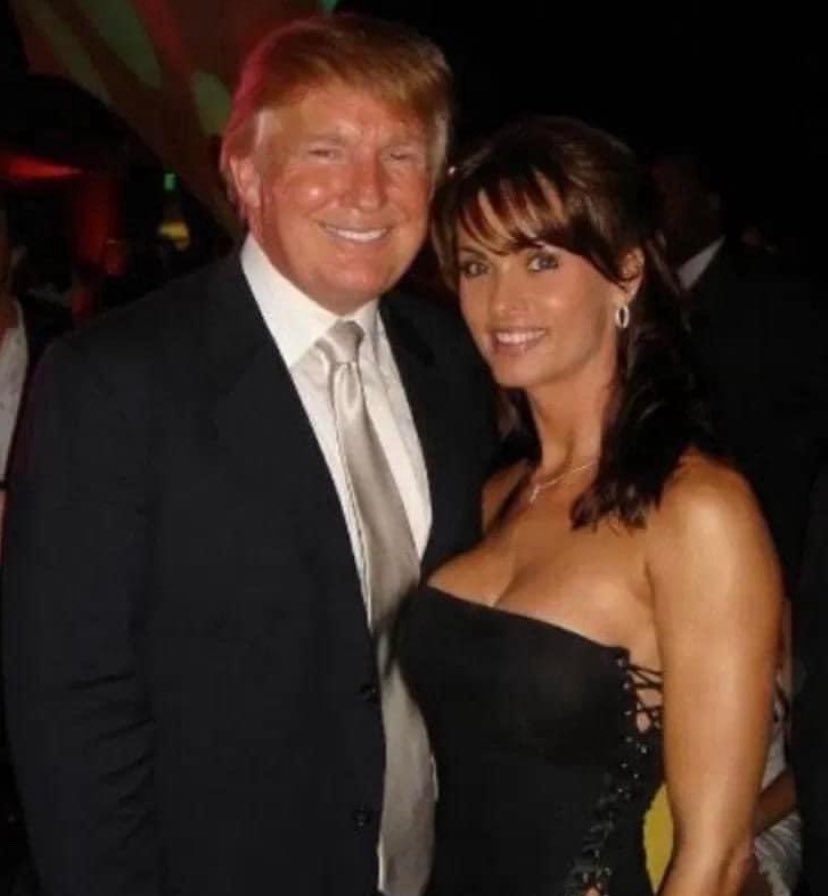What a lovely photo of two lovebirds, Donald and Melania! ❤️ Oops, that’s actually Karen McDougal, the Playboy centerfold that Donny had a 10 month affair with while Melania was pregnant. Of course, the story was a ‘catch and kill’ before the 2016 election. #ElectionInterference