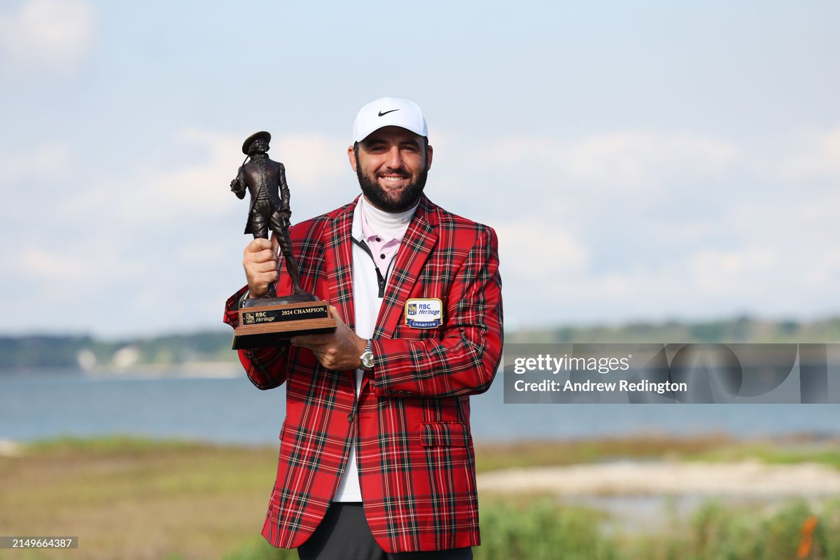 Scottie Scheffler celebrates with the trophy and the tartan jacket after winning the #RBCHeritage at Harbour Town Golf Links 📸: @ReddersGolf #ScottieScheffler #Golf