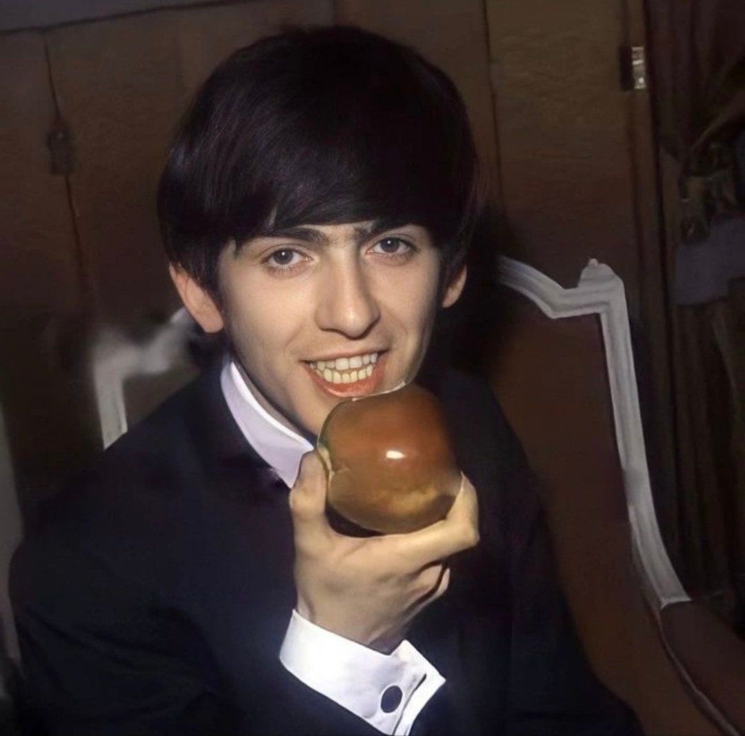 George Harrison eating an apple (April 22nd, 1964)