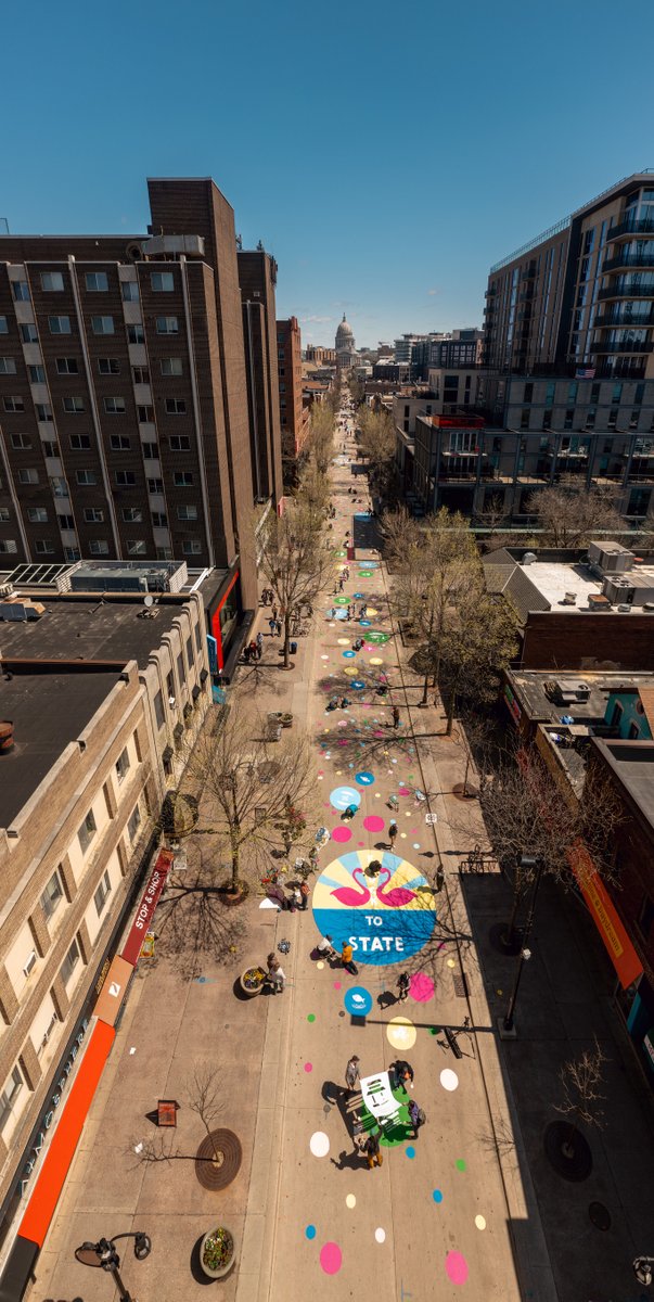 Thank you to the 600 talented volunteers who made State Street blossom with new color this Sun! The project helps jumpstart the pedestrian mall experiment, which will feature new street art, benches & planters. #FlockToState More via @WiStateJournal here: ow.ly/ysEW50RlgCR