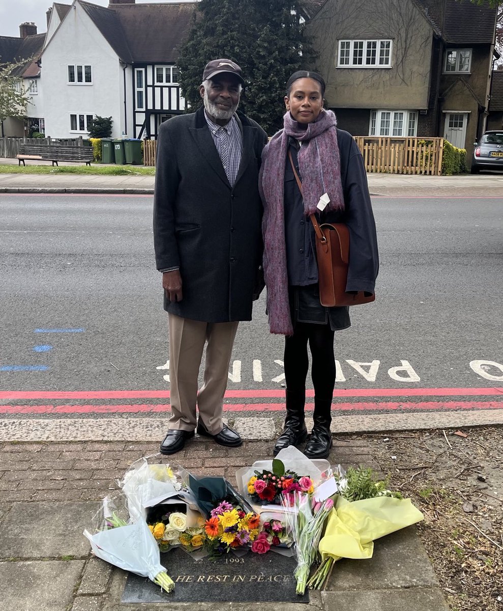 Mercedes with her godfather Neville laying flowers today at the bus stop where Stephen died. 

Rest in power Stephen. 

#StephenLawrence
