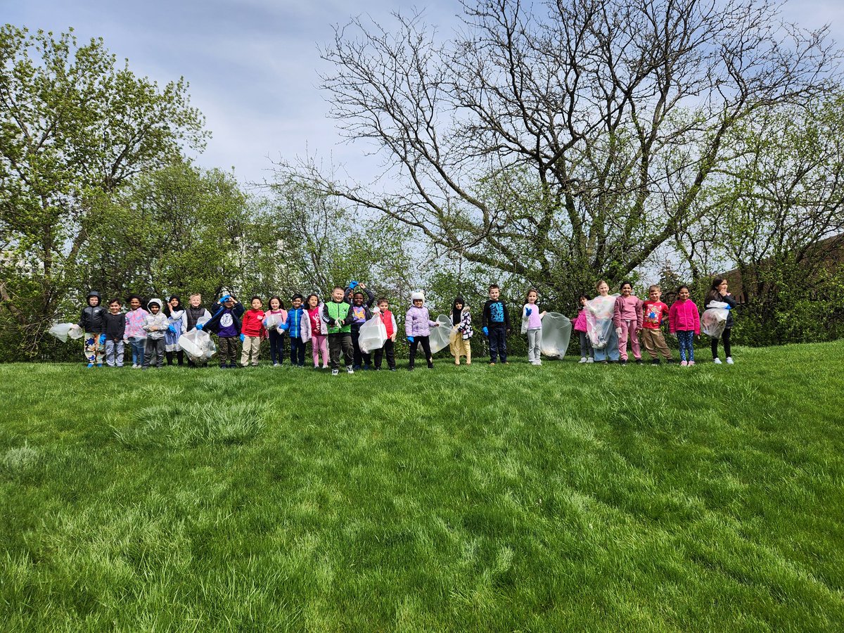 The kindergarteners get cleaning. Happy Earth Day everyone!