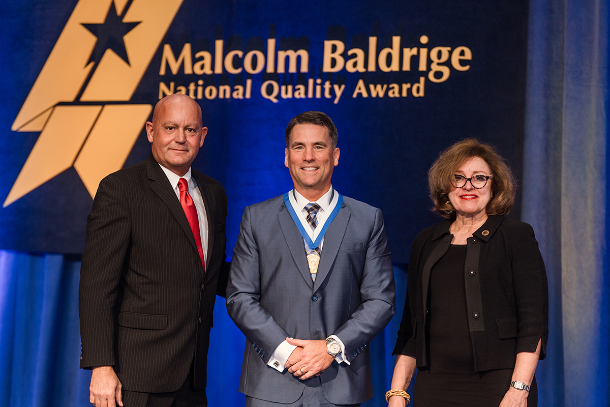 Bobbie Cain, SVP and CIO North America for @SchneiderElectric (center) received the 2024 Foundation Award for Leadership Excellence in Business from CEO Al Faber (left) and Board Chair Dr. Kay Eggleston at the 35th Quest for Excellence®, April 9, 2024, National Harbor, Maryland.