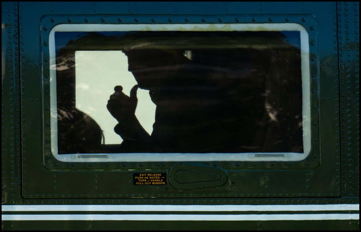 .@POTUS is seen aboard Marine One as he lands on the South Lawn following a trip to Triangle, Virginia.