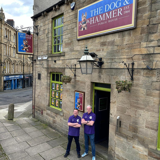 TheTerraceDews's tweet photo. We said 'why not hire your own pub'? So, Andrew and Terry from @boom_mirfield said 'OK, let's change the logo, the shirts, and the signage'. 

That's what we call a pub takeover! https://t.co/hKAIJw6hwe https://t.co/xbRBlmiEgH
