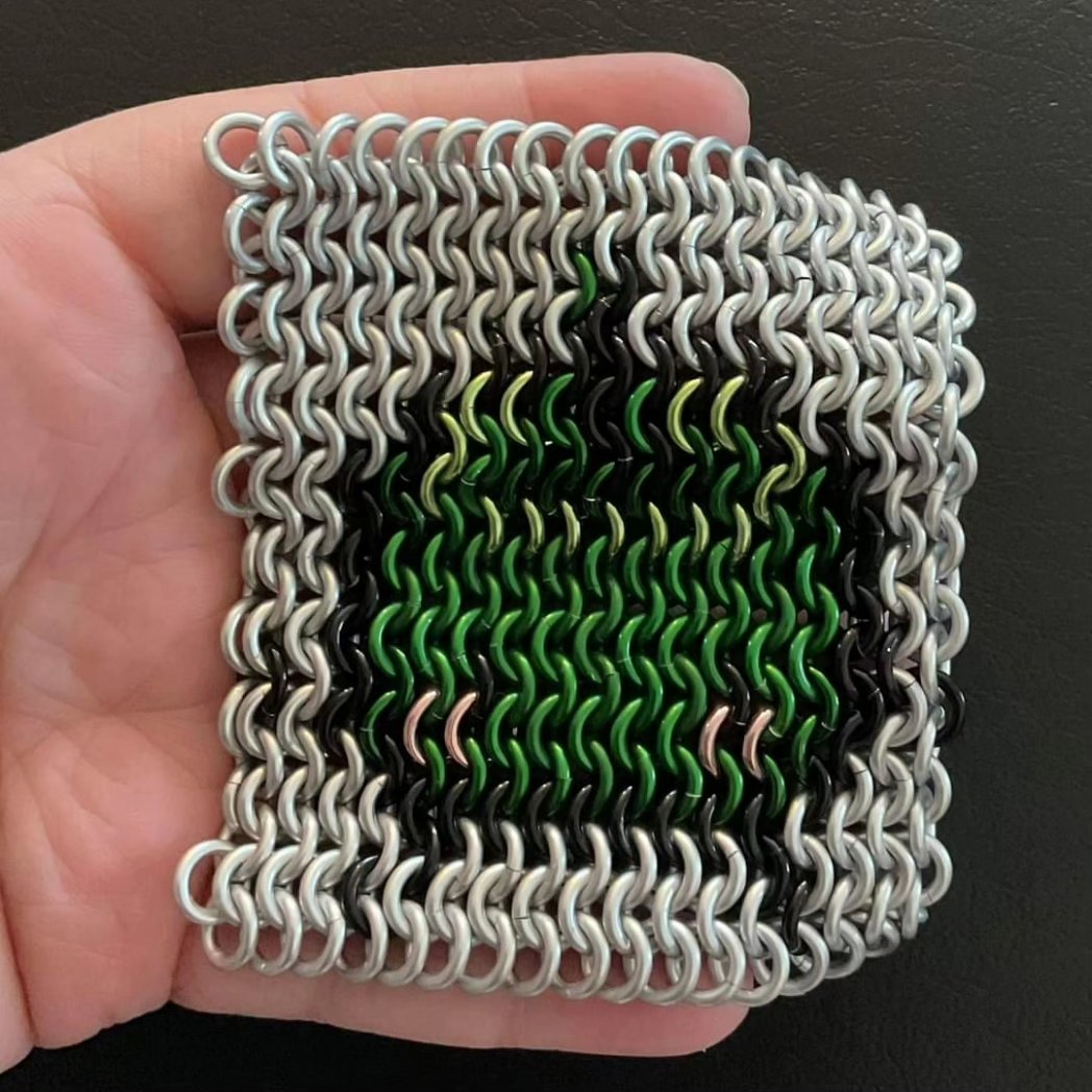I think I forgot to share this here! I made a chainmaille junimo fidget!