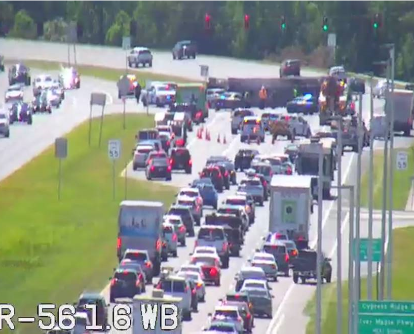 April 22, 2024 @ 11:10 AM Troopers are on scene of an overturned gravel truck at the intersection of SR-56 & Cypress Ridge Blvd, just east of I-75, where nearly 40 tons of gravel spilled onto the eastbound lanes. Crews are on-scene working to remove the gravel & open the road.