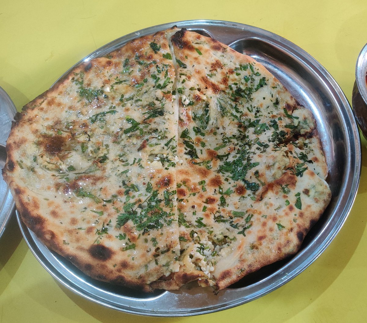 This is a Nikka (small size) Paneer Naan from Kake Di Hatti, Chandni Chowk.

Price: Rs. 90/-