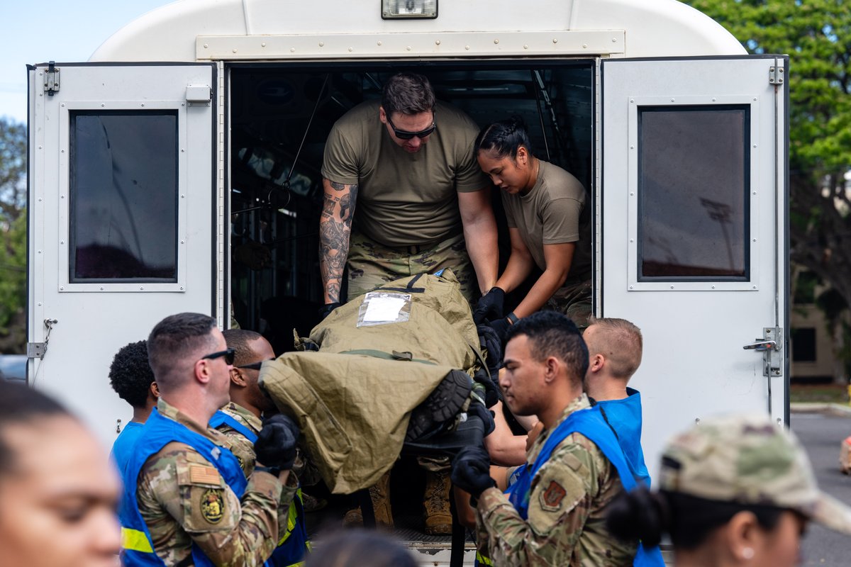 PACAF's tweet image. Members of the 15th Medical Group participated in Exercise Pineapple Thunder which was used to increase readiness, simulating a mass casualty incident in an austere environment. #ReadyAF