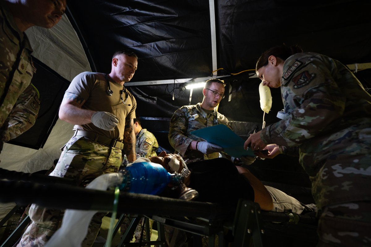 PACAF's tweet image. Members of the 15th Medical Group participated in Exercise Pineapple Thunder which was used to increase readiness, simulating a mass casualty incident in an austere environment. #ReadyAF