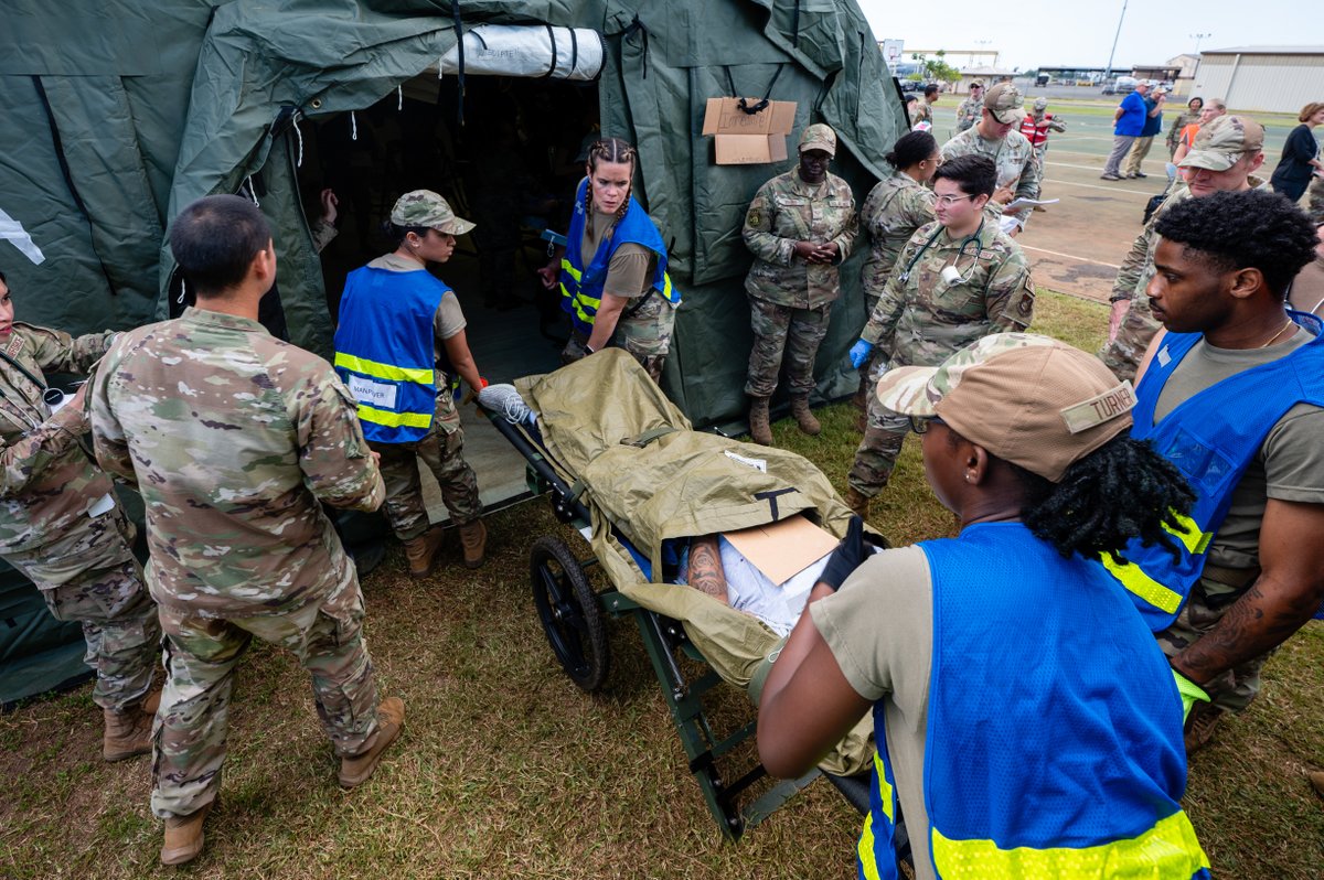 PACAF's tweet image. Members of the 15th Medical Group participated in Exercise Pineapple Thunder which was used to increase readiness, simulating a mass casualty incident in an austere environment. #ReadyAF