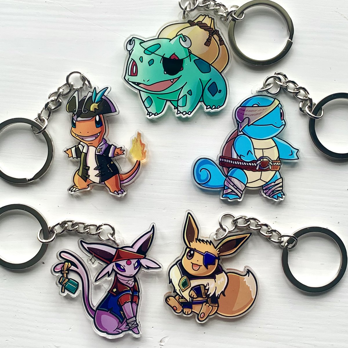 OH EM GEE!! They're here!! ☠️ Set sail with my BRAND NEW Pirate Pokemon acrylic key rings! Choose from Charmander, Bulbasaur, Squirtle, Eevee, & Espeon. Imagine them in the Sea of Thieves! Limited quantities - snag yours now! ⚓️ #Pokemon #SeaOfThieves #BeMorePirate