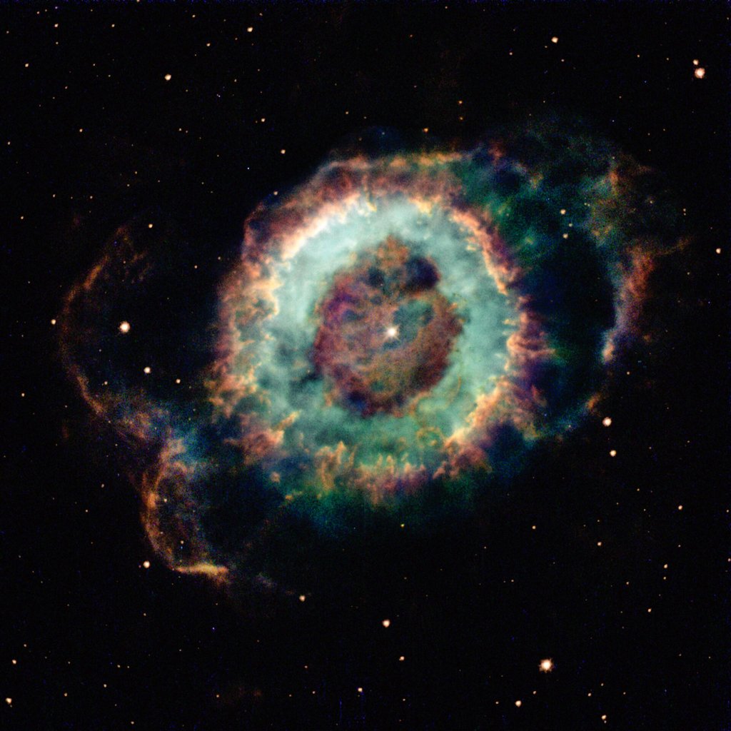 NGC 6369 (Little Ghost Nebula) is a small, festively coloured planetary nebula located between 2,000 and 5,000 light years away near constellation Ophiuchus. Planetary nebulae are so named as they resemble planets when viewed through a small telescope. 📷 ESA #NGC6369