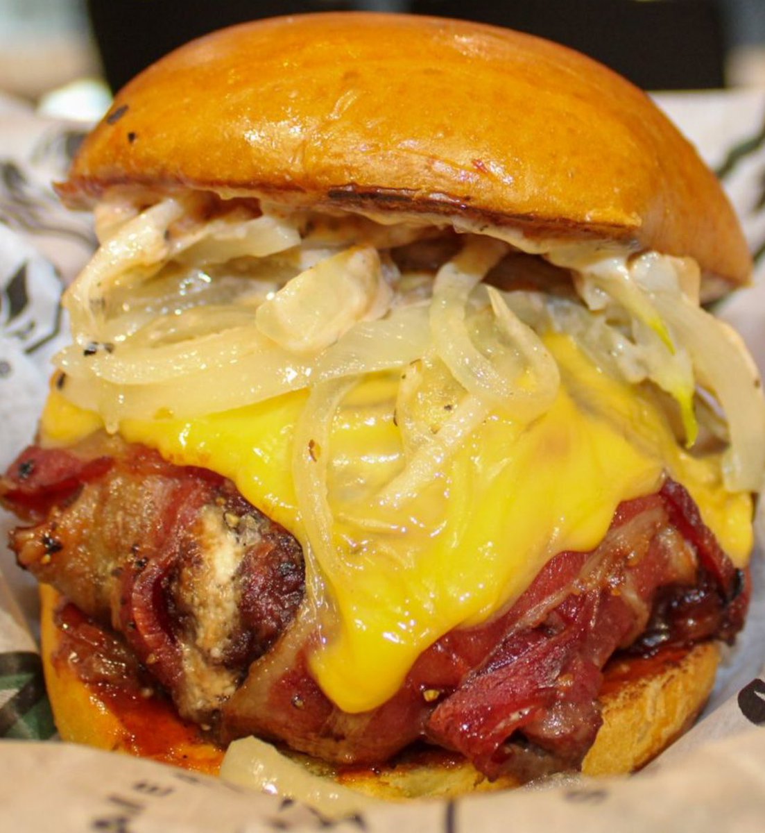 New for @dallasmavs & @DallasStars playoff games: Smoked Bacon-Wrapped Juicy Lucy Burger stuffed with jalapeño popper cheese filling, wrapped in bacon, topped with grilled onions, BBQ bacon aioli & cheddar cheese