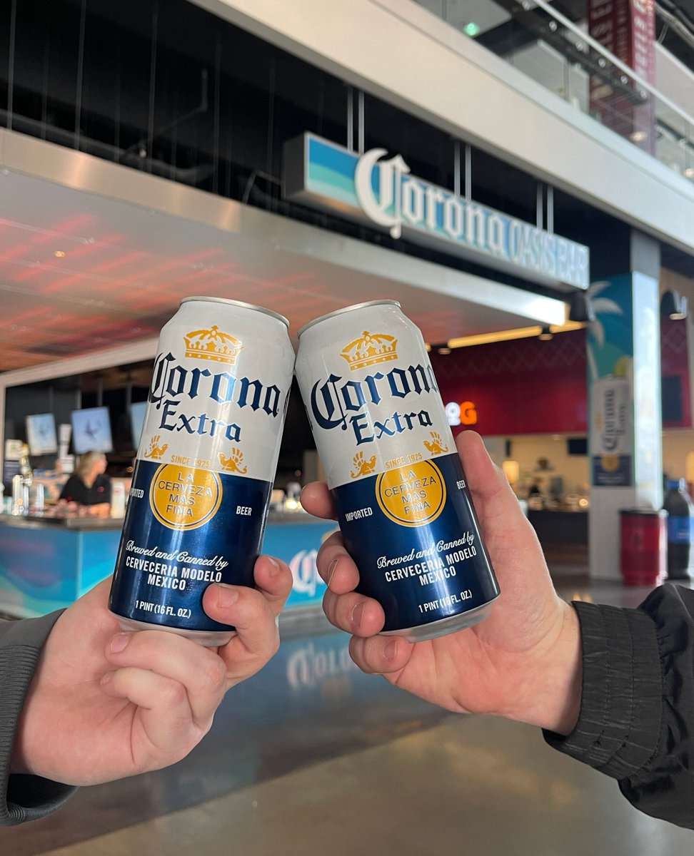 An ice-cold Corona with a lime is calling your name tonight! Visit our brand-new 𝓒𝓸𝓻𝓸𝓷𝓪 𝓞𝓪𝓼𝓲𝓼 bar on the Main Concourse outside of Section 111 and enjoy! 🍻🌴