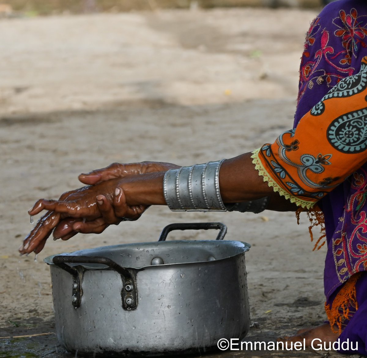 In a village of Sindh Pakistan a woman is washing her hands before cooking for her family. So even villagers take care of hygiene And you can see here beautiful dress and cultural silver wear in hands. . . #women #woman #sindh #pakistan #fashionaccessories #fashion #jewelry