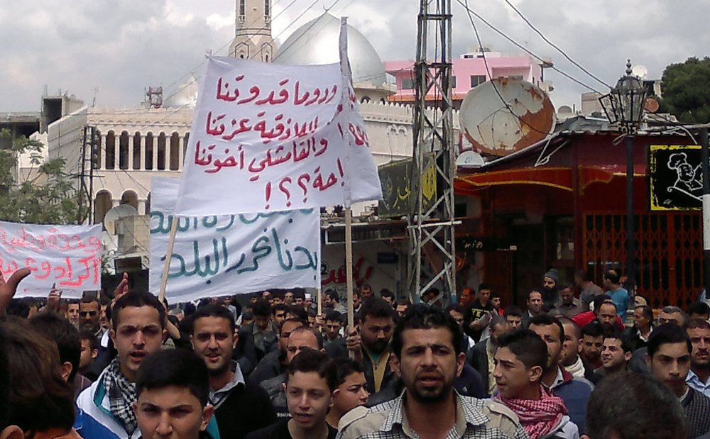 On this day in 2011, protests in Syria reached a new intensity with the Great Friday demonstrations.

These included, for the very first time, large-scale demonstrations in Damascus along with other major protests in Daraa, Homs, Baniyas, and Qamishli.