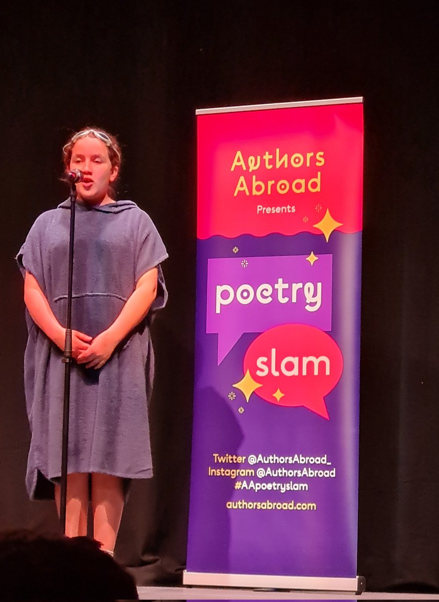 What a moment, watching my youngest fall in love with words @AuthorsAbroad_ #AApoetryslam #prouddad