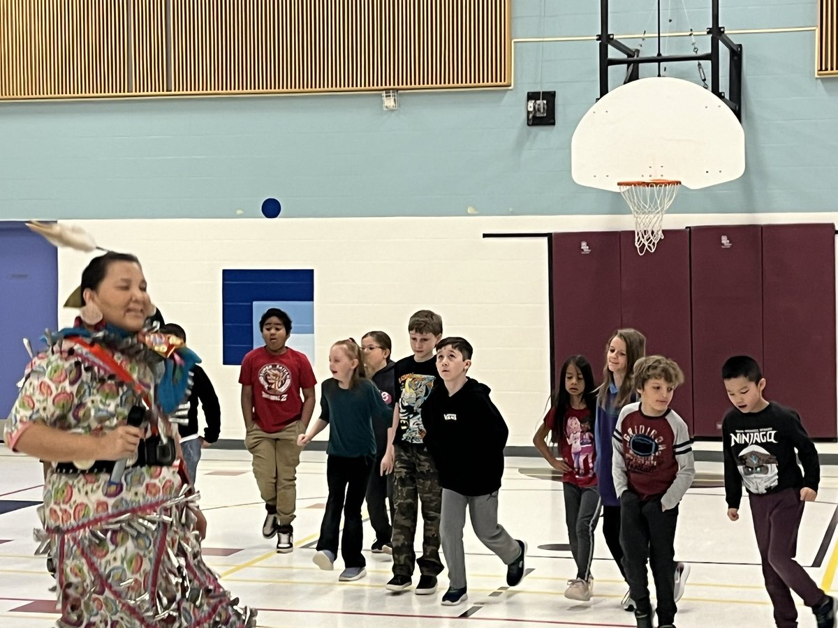 BrynczkaMs's tweet photo. Students were honoured today to have a Jingle Dress dance session with the instructive and talented @MASConline First Nations artist Amanda Fox. @StLukeNepean https://t.co/uv6iGJPr13